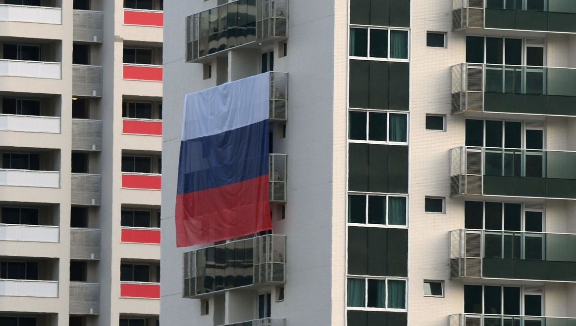 МОК разрешил российским спортсменам вывешивать флаг страны в спальне
